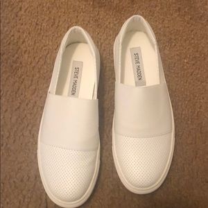 Steve Madden White tennis shoes.